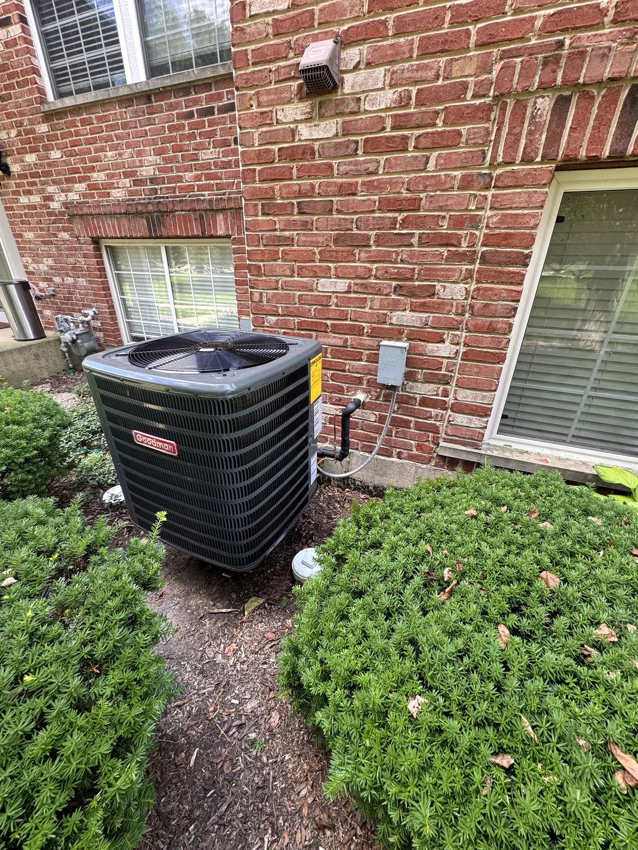 Residential outdoor air conditioner serviced by Premier Air
