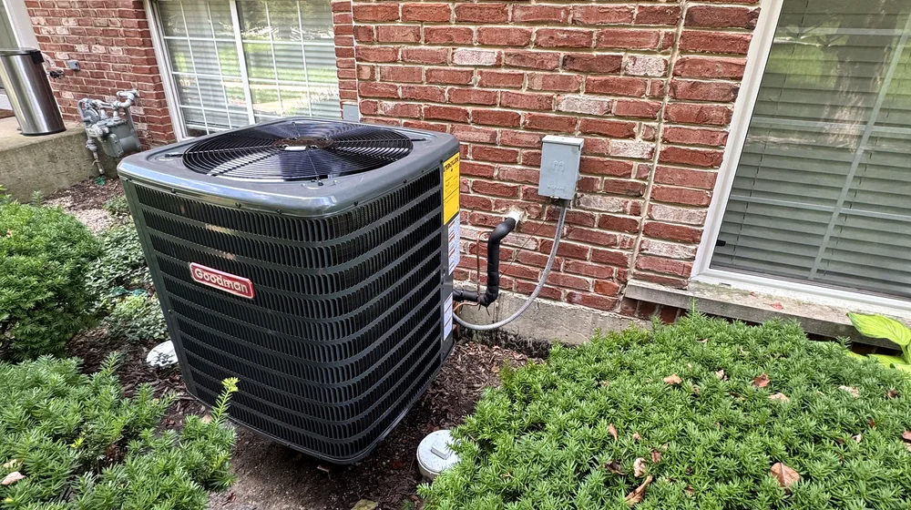 Outdoor AC condenser service at a home