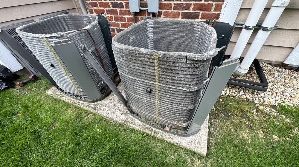 Residential outdoor HVAC equipment prepared for maintenance